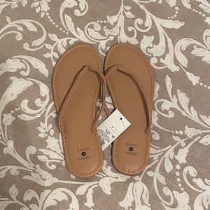 Nude flip flop sandals